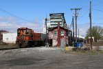 The old EJ&E Bridge 631 tower still stands guard as IHB's 114 Job passes